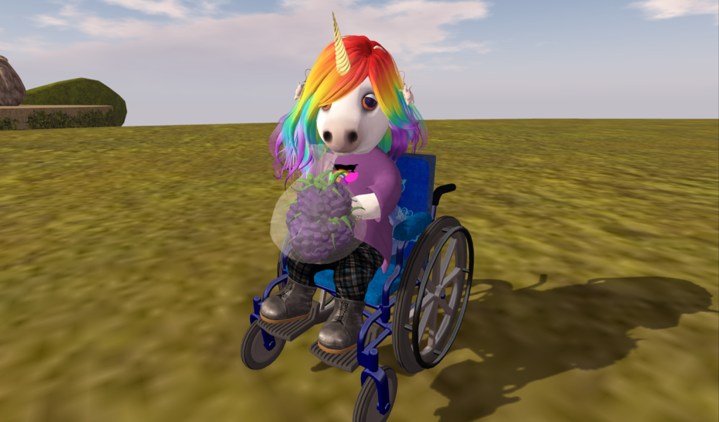 Image of Minie sitting in her wheelchair, holding a bag of wootberries. Her hair is rainbow colored, and she is a tiny unicorn.